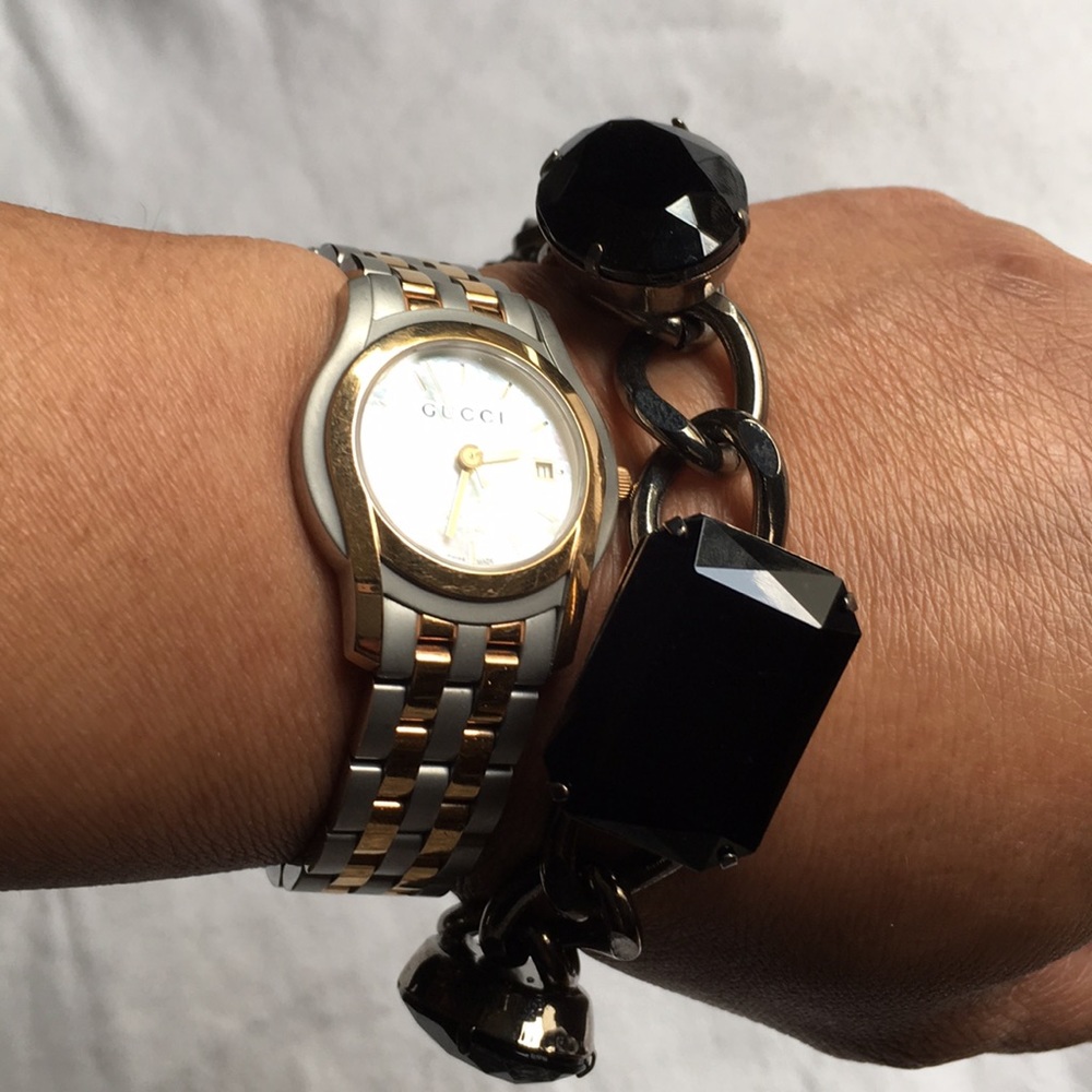 Never been used bracelet with 4 black stones.